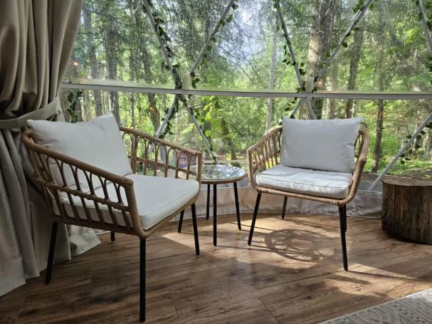 Counselling chairs in the geodome overlooking the forest.